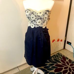 Navy Blue pencil skirt strapless dress with lace, bow, and pockets